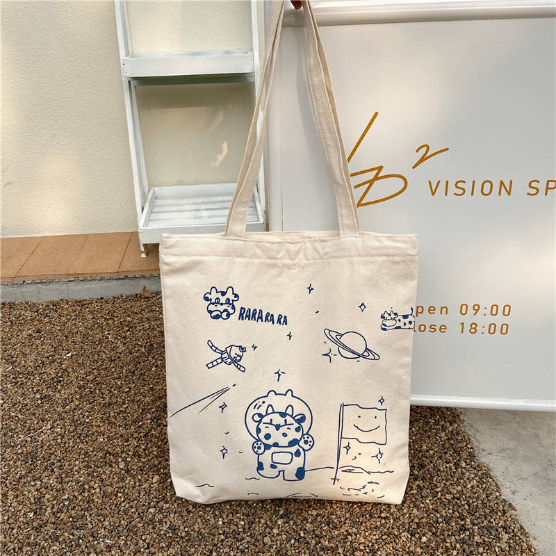 【 In Stock 】13173 Cute Moon Landing Cow single-shoulder Bag, student girls' schoolbag, canvas bag, large capacity wholesale undefined