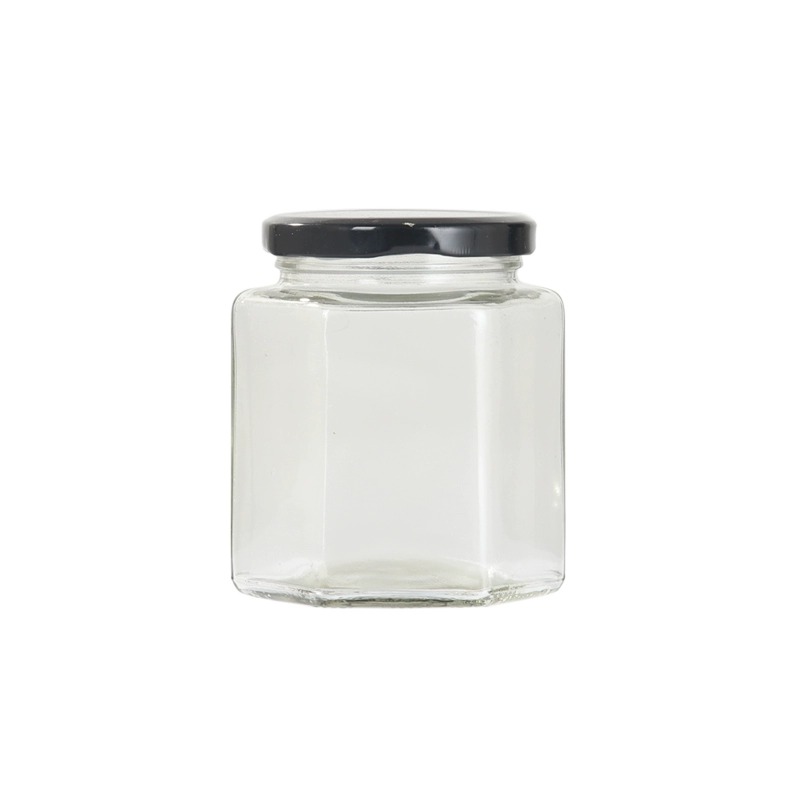 Botella de vidrio hexagonal botella sellada frasco grado alimenticio crema de limón con tapa una libra de miel salsa de chile mermelada botella hexagonal vacía