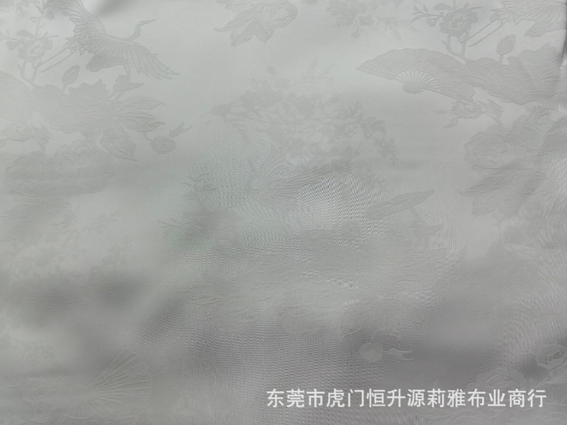 新款钻石丝提花面料 亮丝飞鹤提花布 潮流国风旗袍连