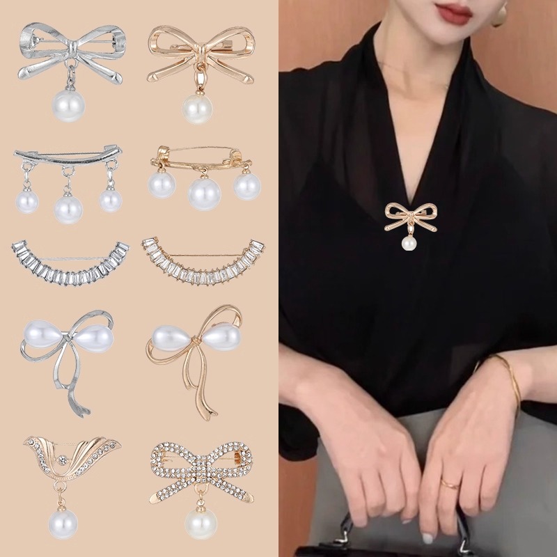 Temperamento bowknot perla alfileres mujer exquisita hebilla anti-luz sensación de alto nivel cintura artefacto cintura pantalones pequeña hebilla fija
