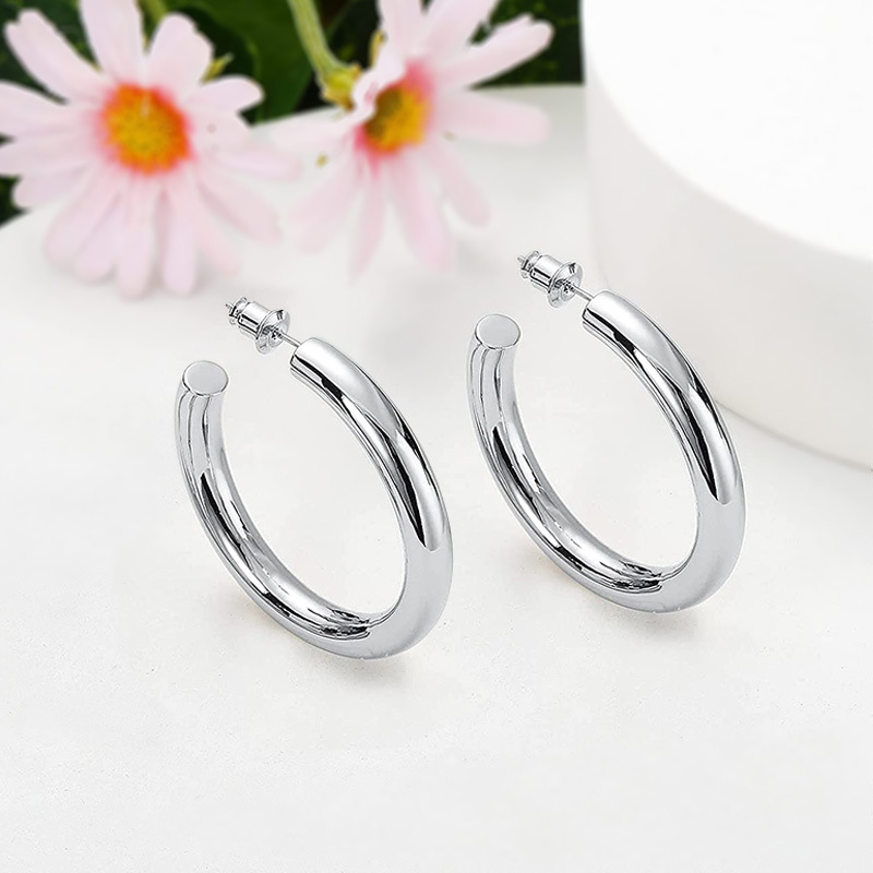 Orecchini a cerchio con zirconi multicolore e cristalli per donna_voghion.com