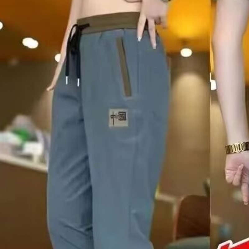 Pantalones chinos casuales versátiles tendencia de verano ultra delgados 2026 pantalones transpirables de hombre