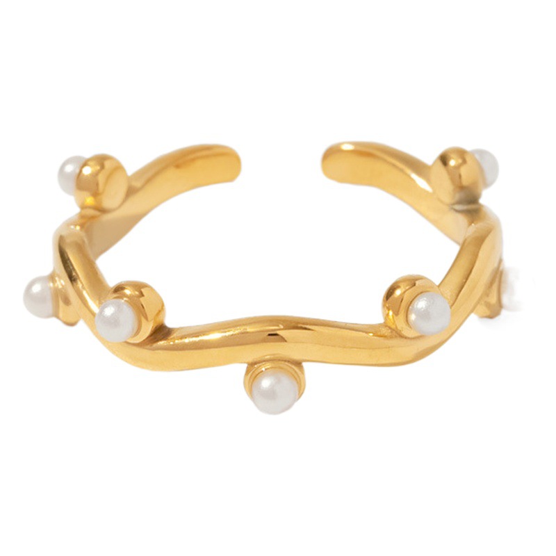 Anillo abierto de perlas blancas con incrustaciones de oro irregulares de 18K INS estilo francés anillo de acero de titanio de moda para mujer
