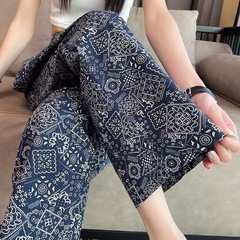 青の図形の民族の風のズボンの太っているmm300斤の花の睡眠のズボンの女性の春秋の新型のゆったりしている家のズボンの外で着る