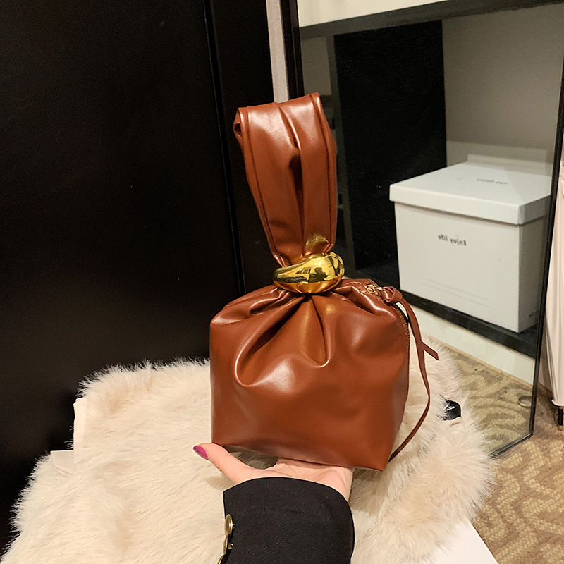 Bolsa de cubo simple y casual, 2025 primavera nueva moda coreana bolso de mano de alta belleza bolsa de mujer decoración