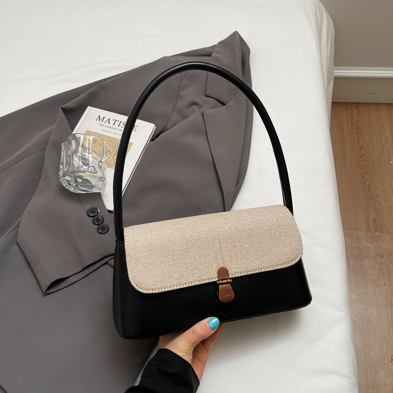 Retro nicho de viaje bolsos de brazo bolsos de mujer 2026 primavera bolsos de hombro diarios de moda bolsos de mano de alto valor