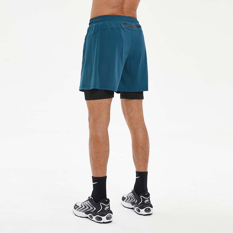 Pantalones cortos deportivos de secado rápido de los hombres de verano forro de doble capa de alta elasticidad para correr pantalones laterales transpirables con cremallera en stock al por mayor