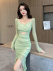Mesh splicing tight pleated buttocks wrapped long sleeved dress
