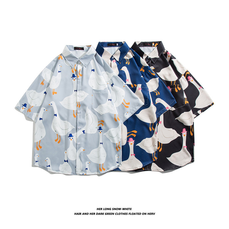 Estilo japonés retro completo impreso de dibujos animados camisa de manga corta de verano de los hombres Harajuku estilo suelta pareja desgaste Ruan guapo camisa de media manga