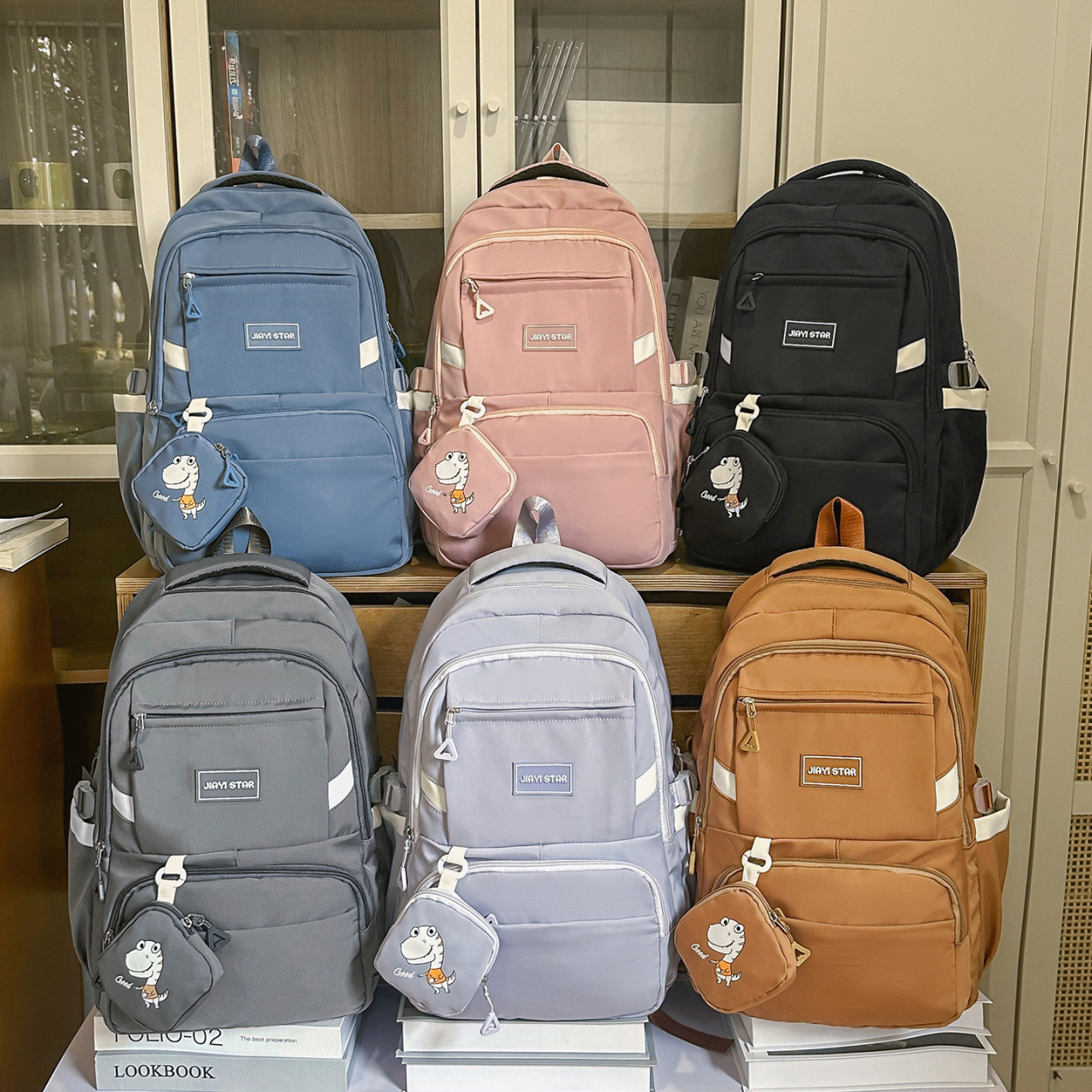 Mochila coreana de alto valor transfronterizo nueva mochila de viaje corto multicapa para reducir la carga, mochila de estudiantes de gran capacidad image 3