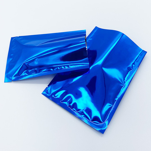 Factory direct supply of color aluminum foil flat pocket facial mask foot patch packaging bag scented tea medicinal powder aluminized blind bag three-side sealing bag