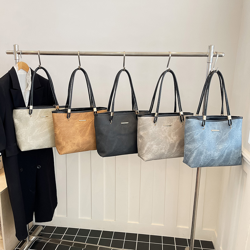 2026 nuevo retro de gran capacidad bolso de mano de hombro para mujeres de alta calidad sensación de viaje bolso de moda versátil bolso simple