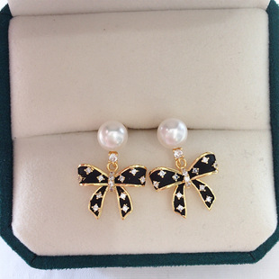 Zhuji natural freshwater pearl earrings women 18K gold niche sweet paint bow pearl earrings wholesale