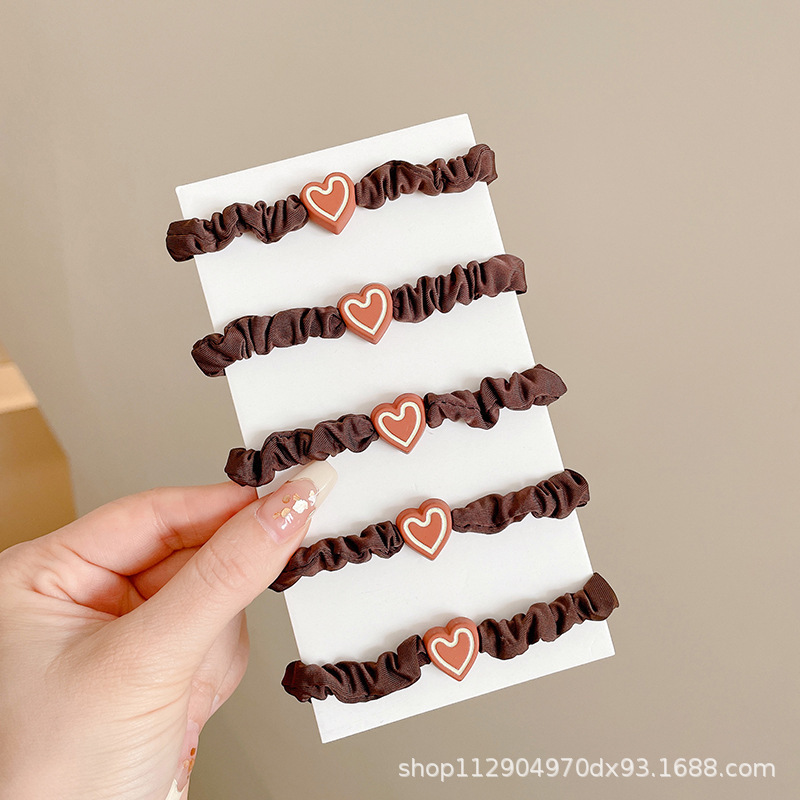 2025 nuevo estilo simple cabello de moda de alta elasticidad correa de correa de cabello multifuncional cubierta de cuero durable cabello bola adornamiento para el cabello