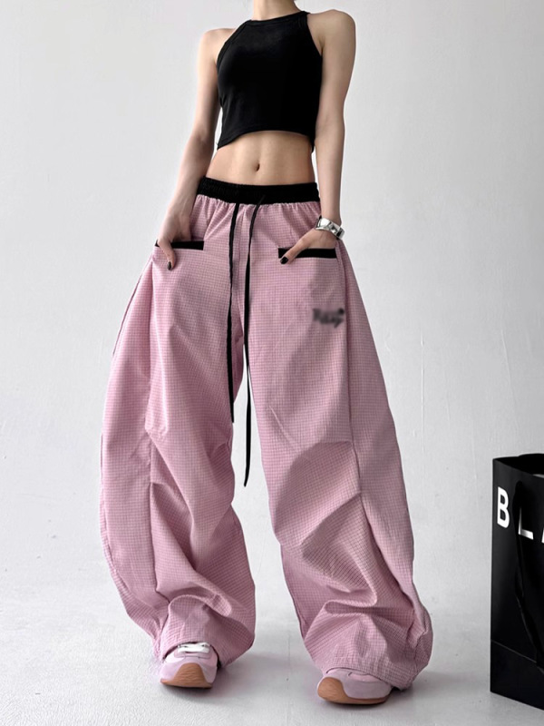 街頭のファッションブランドのストライプの曲がりくねったナイフのカジュアルなズボンの女性2025年の夏の新型の垂れ下がった感じがゆったりしています。|undefined
