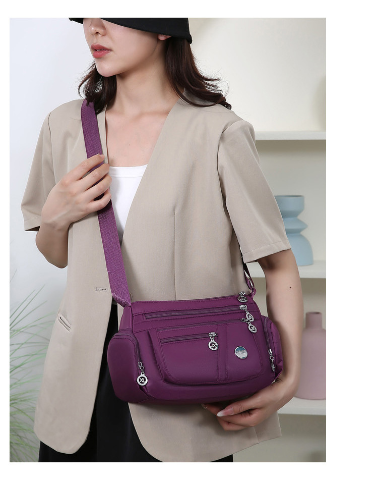 A new popular women's crossbody bag with multiple layers made of Oxford fabric, fashionable, casual and trendy. It's a single-shoulder bag for middle-aged and elderly mothers undefined
