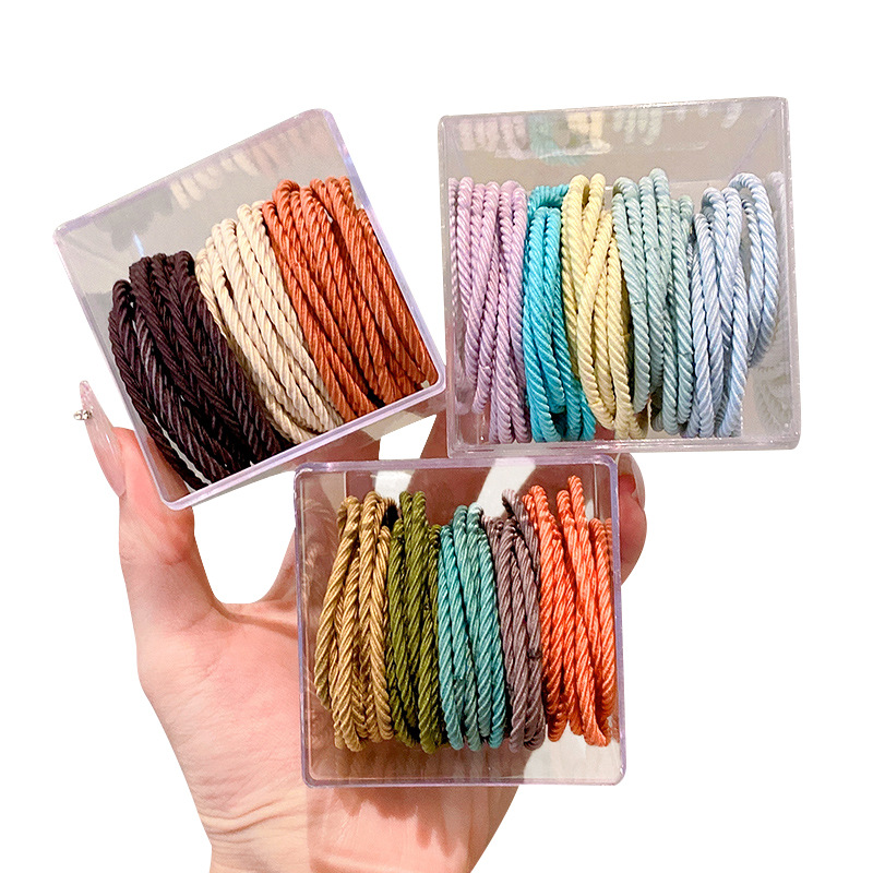 50 piezas en caja ~ banda de goma corbata de pelo femenino cuerda de cuero alta elástica durable pequeña cubierta de cuero Internet celebridad temperamento simple cuerda de pelo