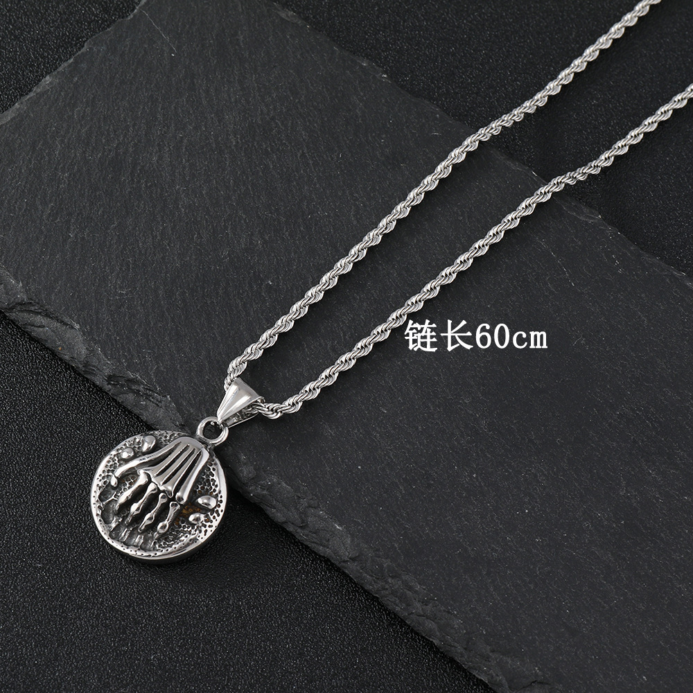 Europa y América de acero inoxidable hip hop joyería personalidad retro cabeza de león de los hombres de fundición de acero de titanio collar cráneo garra fantasma colgante