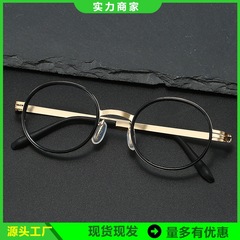 レトロな丸い枠の金属のメガネは近視の度数の青いメガネの男女のタイプのビジネスの全枠の光学のメガネを配合することができます。