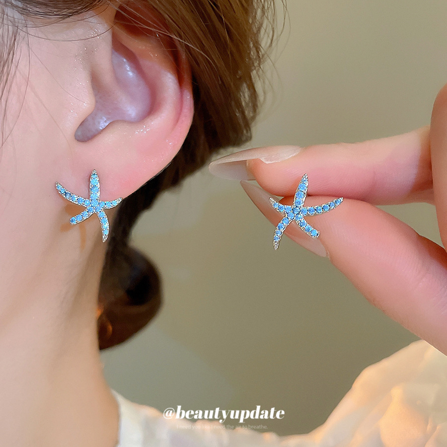 Aguja de plata, circón, estrella de mar azul, pendientes de temperamento ins coreanos, pendientes de todo fósforo de moda femenina, sentido de diseño, nicho