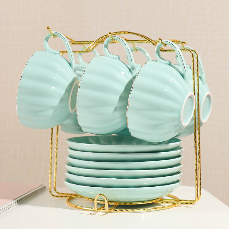 Comercio exterior de cerámica taza de café platillo juego de té regalo simple flor taza de té hogar taza de agua café traje de regalo con estante