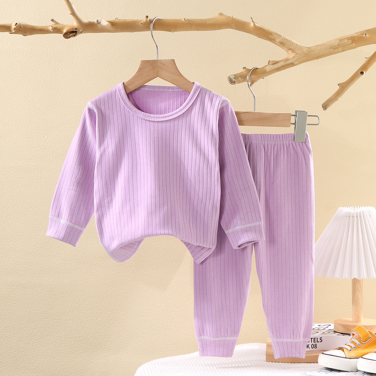 Camisa de fondo sin hueso para niños primavera y otoño ropa de otoño para niños medianos y grandes pantalones largos bebé ropa de hogar simple niños y niñas pijamas de cuello redondo