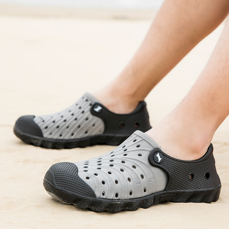 Sandalias Baotou transfronterizas nuevos zapatos casuales al aire libre ligeros y transpirables de verano para hombres, zapatos de playa, zapatos huecos, hombres