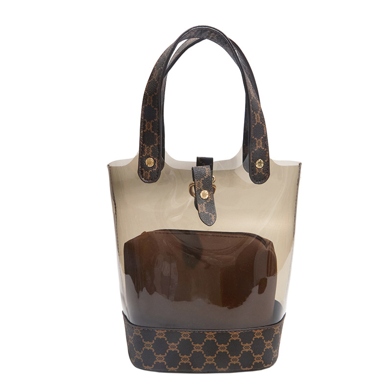 Bolsa de cubo transparente de moda de empalme de primavera y verano de 2026 nueva impresión de contraste de color personalidad bolso de hombro de textura mochila de moda