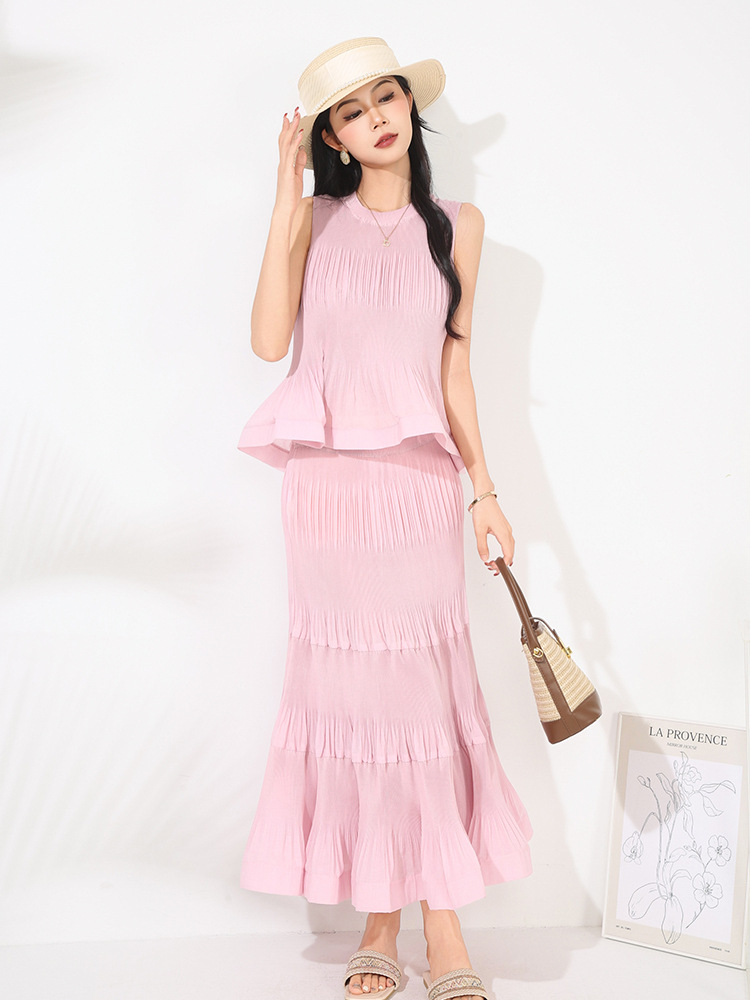 女性の夏のツーピーススーツホット販売新デザインつまようじプリーツノースリーブベストトップハイウエストスカートスーツ