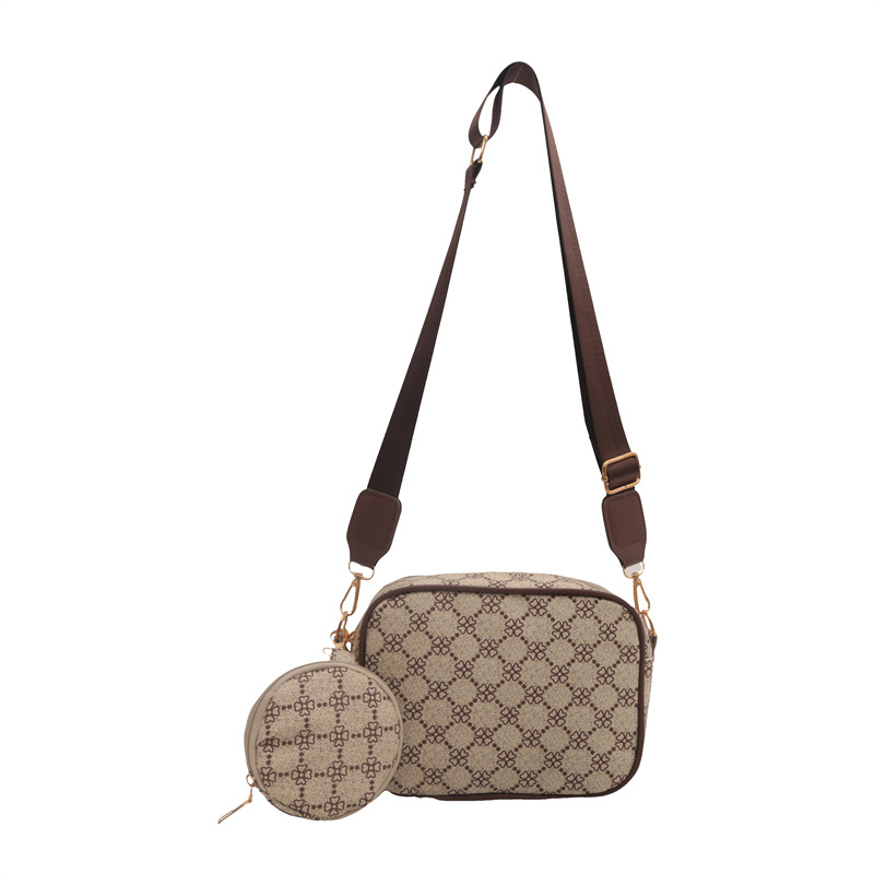 2024 nueva moda simple retro bolso impreso de mujer extranjero ancho cinturón de hombro bolso de hombro casual bolso de mochila