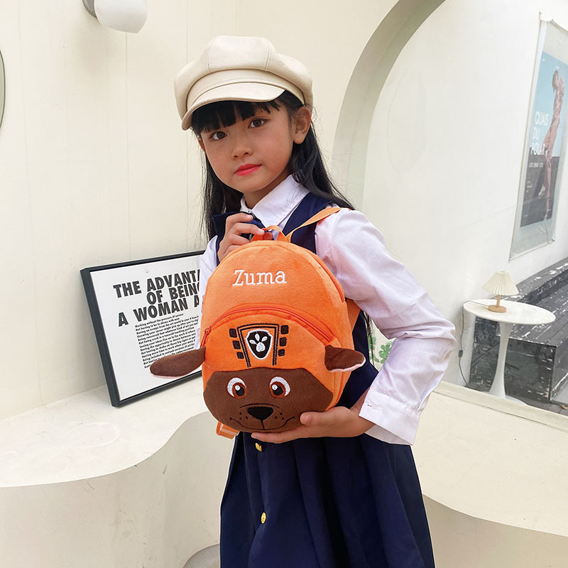 Bolso de felpa informal para bebés transfronterizos, monedero de año, reducción de la carga, mochila de comercio exterior de dibujos animados, mochila de ocio