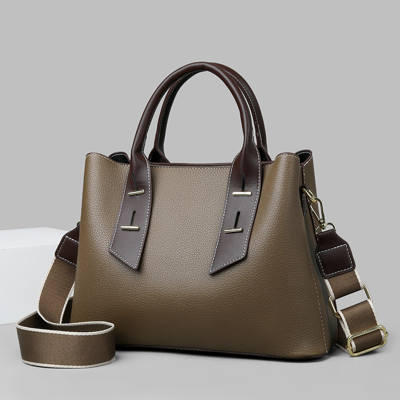 Bag New 2024 women's handbag commuter large capacity wide shoulder strap messenger bag European and American fashion portable women's bag_voghion.com