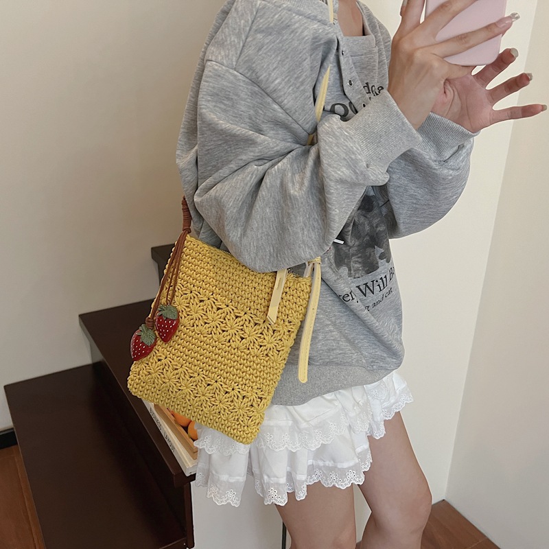 Bolso tejido de moda coreana 2025 verano nuevo bolso femenino bolso de vacaciones junto al mar bolso de mensajero de playa de moda marea