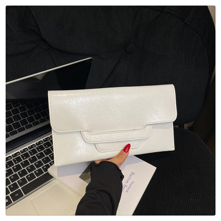 Bolso de mujer de color sólido bolso de cambio de mujer bolso de mano de alto valor de cara simple bolso corto de moda bolsa de sobres versátil