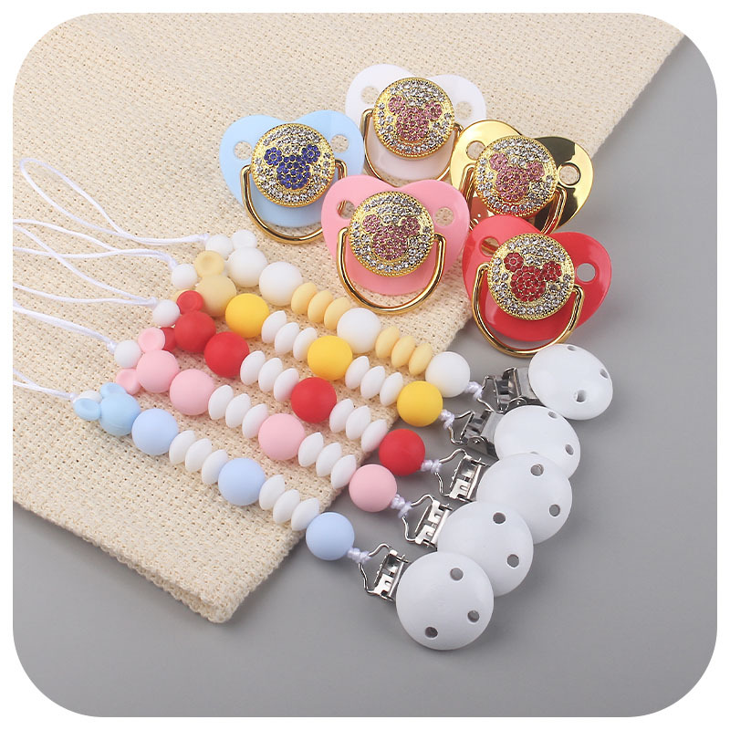 Amazon nuevo bebé suministros creativo silicona chupete cadena bebé brillante diamante Mickey forma chupete traje