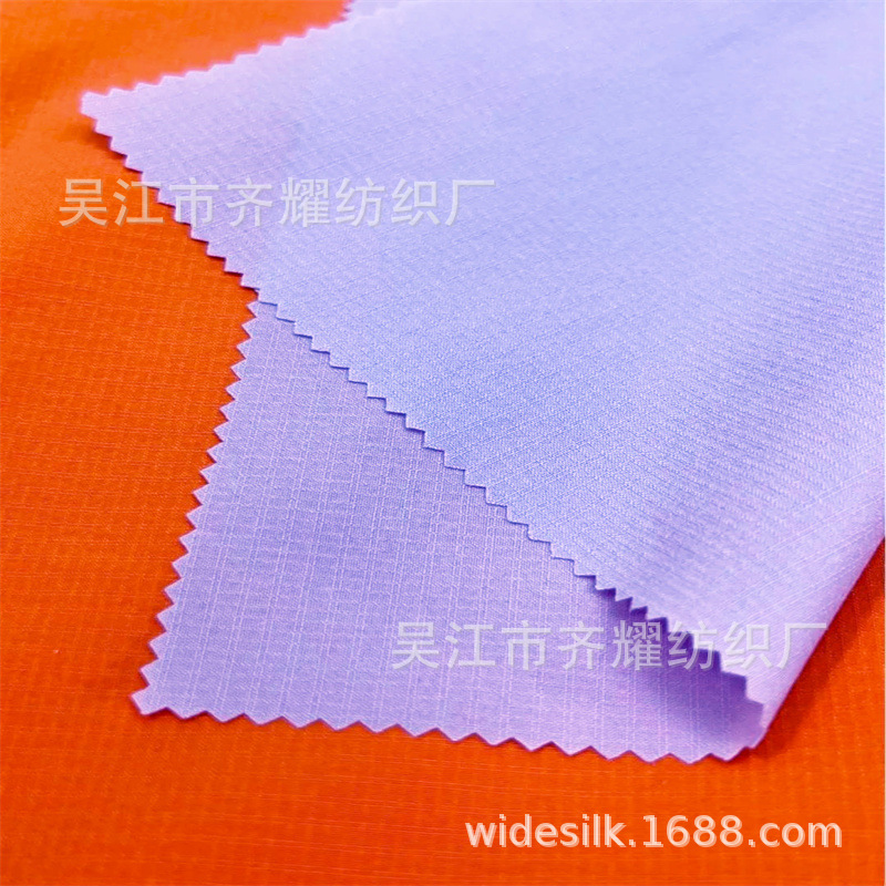 涤纶导电丝格子斜纹四面弹锦涤雪梨纺四面弹吸湿排汗原纱速干弹力