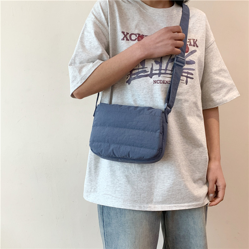 Daily casual simple small square bag Korean spring lightweight personality design popular shoulder crossbody horizontal small square bag_voghion.com