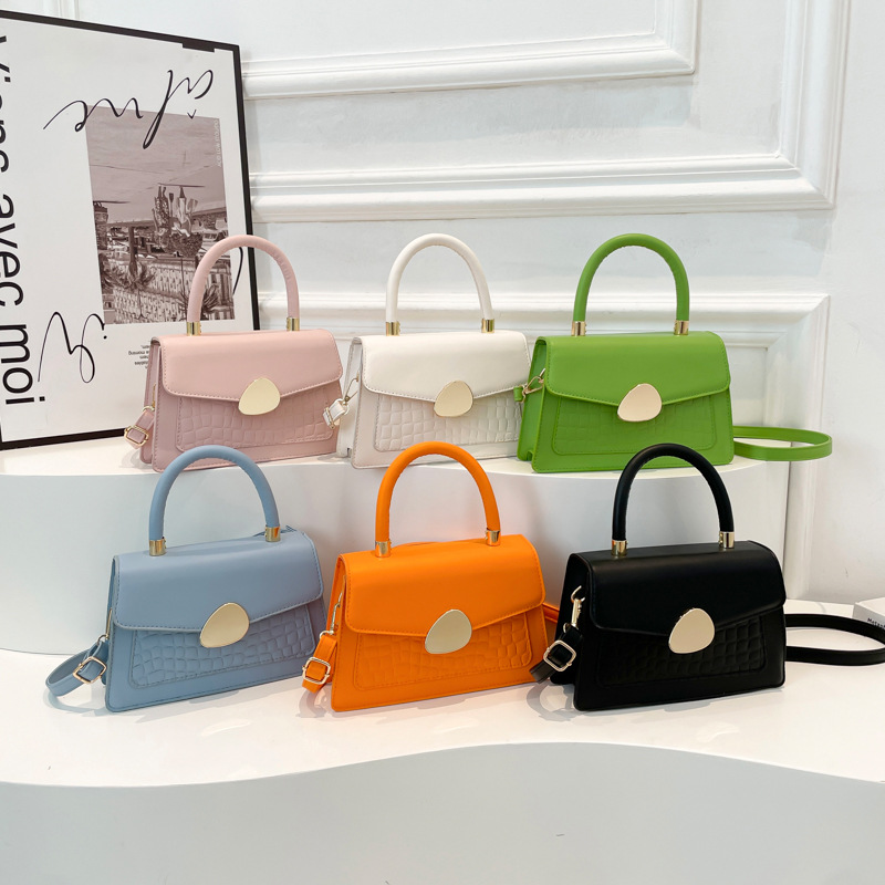 Textura hebilla magnética bolso de moda simple 2025 primavera nuevo estilo ins bolso de mensajero de un solo hombro elegante bolso cuadrado femenino