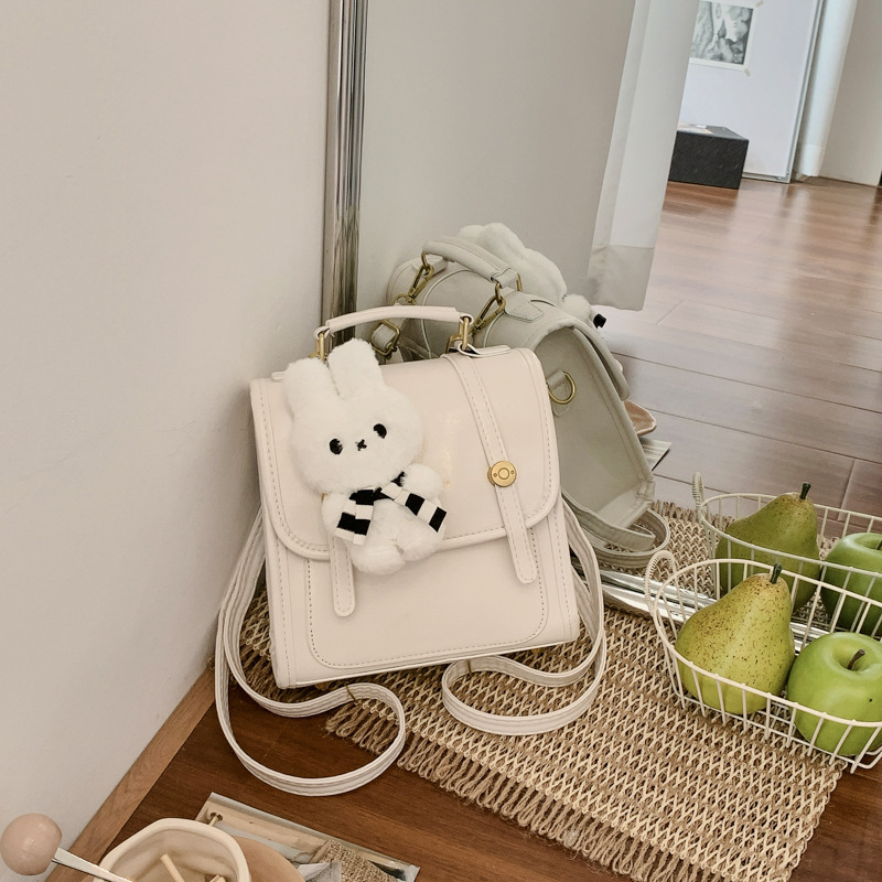 Cantos colgantes de dibujos animados de hombro pequeño bolso de mujer de verano estilo coreano nicho color sólido mochila mujer