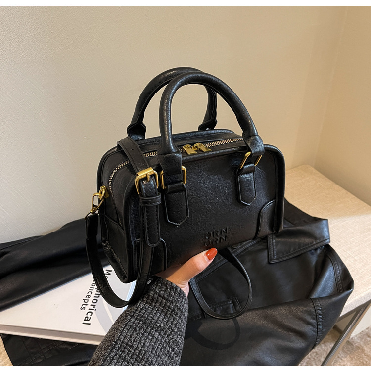 2024 New Maillard Retro Small Pillow Bag Women's Autumn and Winter Trend Korean Handheld Small Square Bag Versatile Crossbody Bag_voghion.com