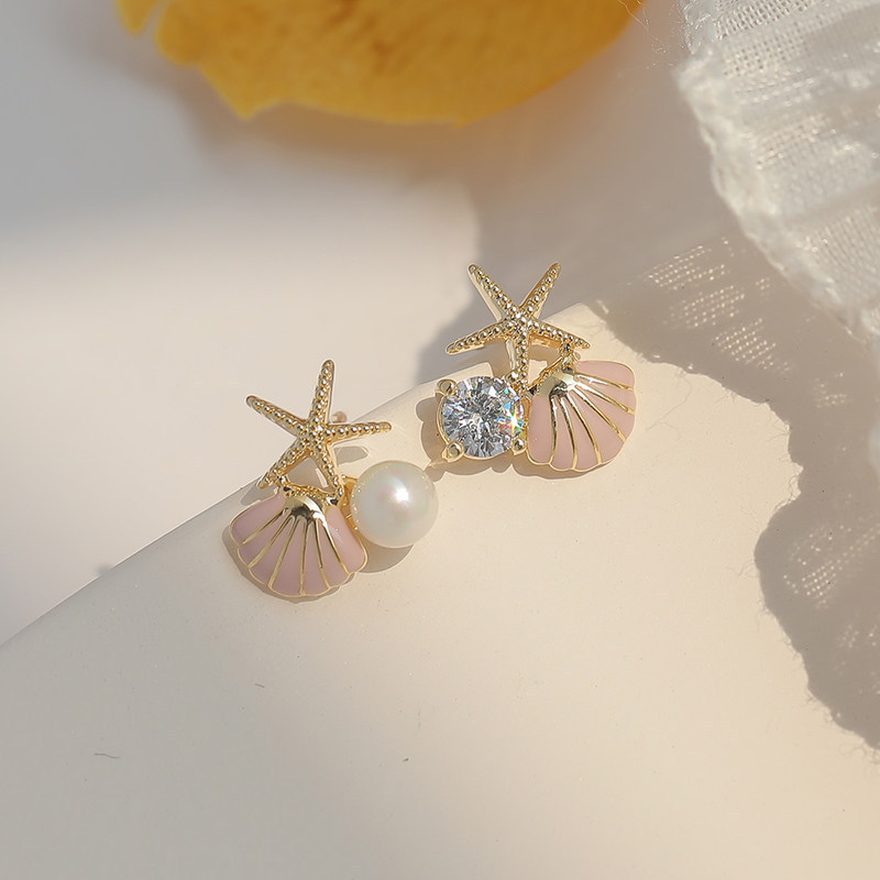 Elegant creative asymmetrical earrings from pearl