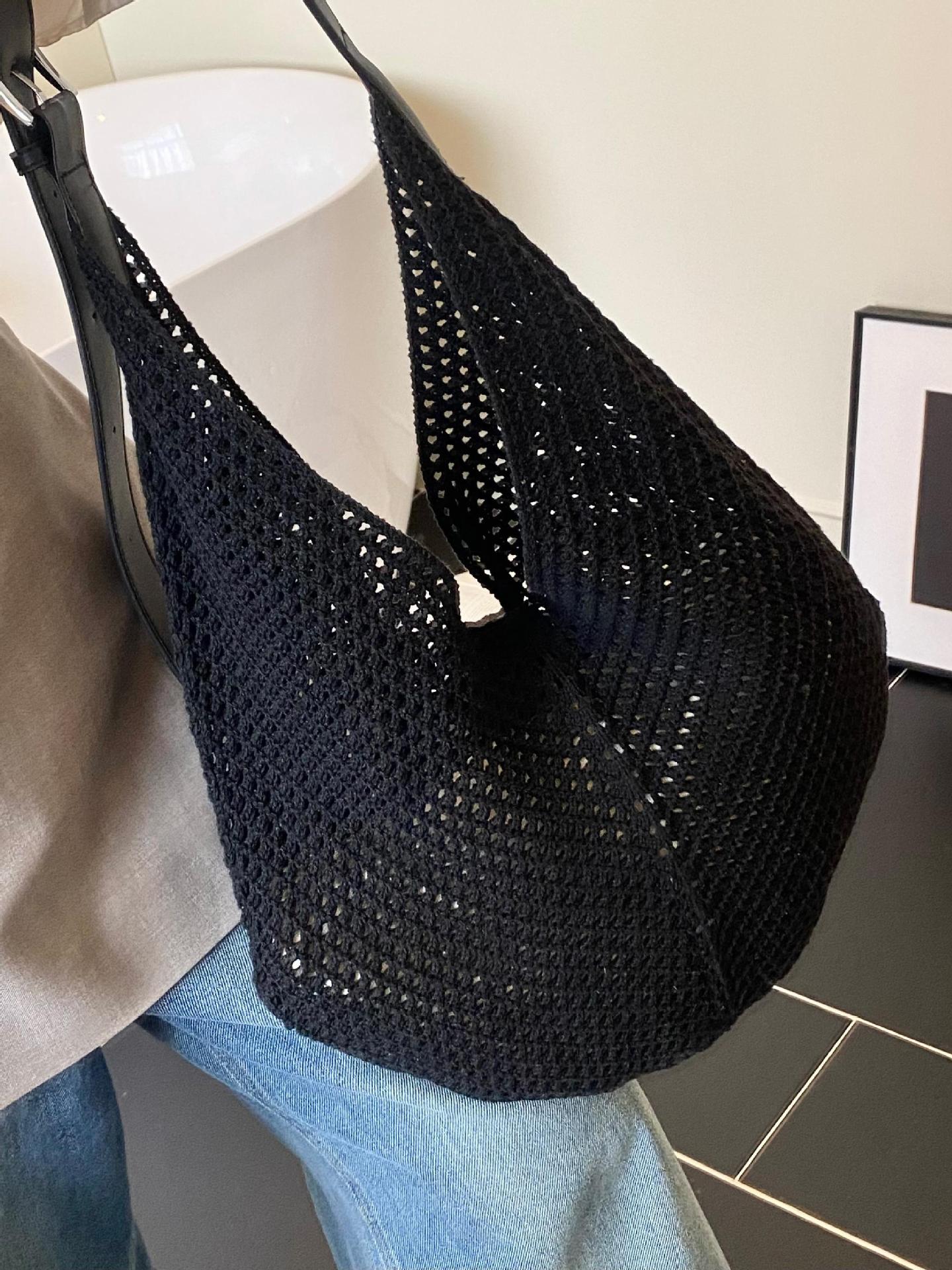 Bolso de axila de estilo explosivo de diseño hueco popular de verano 2025 nuevo bolso tejido de paja de moda bolso de playa señoras