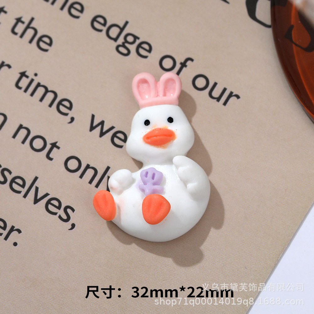 Sombrero de paja al por mayor de pato de celebridad de Internet de dibujos animados de cabeza torcida DIY accesorios de resina teléfono móvil Shell accesorios para el cabello agujero hebilla de zapato