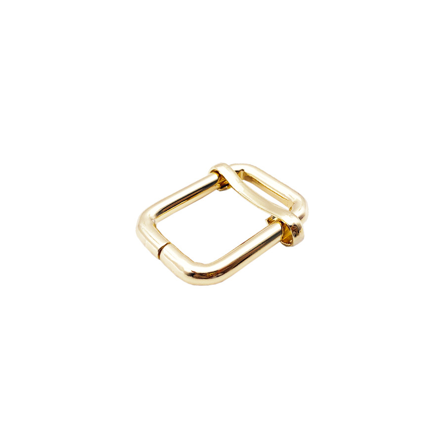 Accesorios de ferretería de alta gama en stock: hebilla metálica en D, hebilla ajustable, hebilla de cable de hierro, correa para bolso de mujer, hebilla de tres niveles.