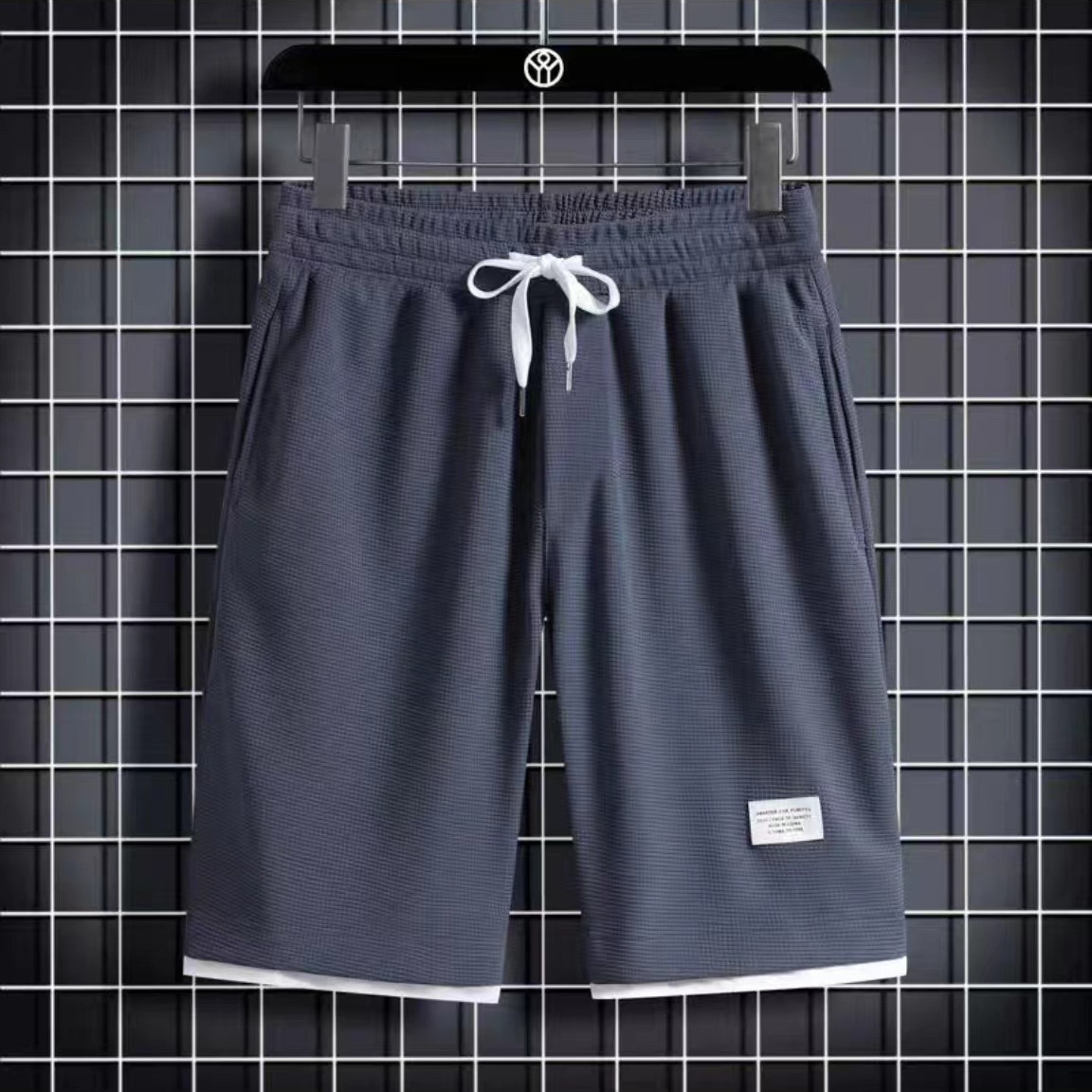 Pantalones cortos de waffle 2026 para hombres, pantalones deportivos casuales, pantalones de fitness, pantalones medianos sueltos grandes.