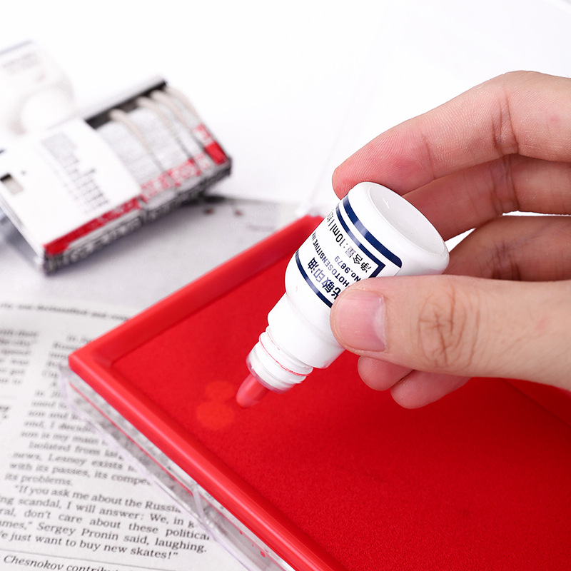 得力9879光敏印油 光敏章印油 財務紅色印章油印油印台萬次章批發