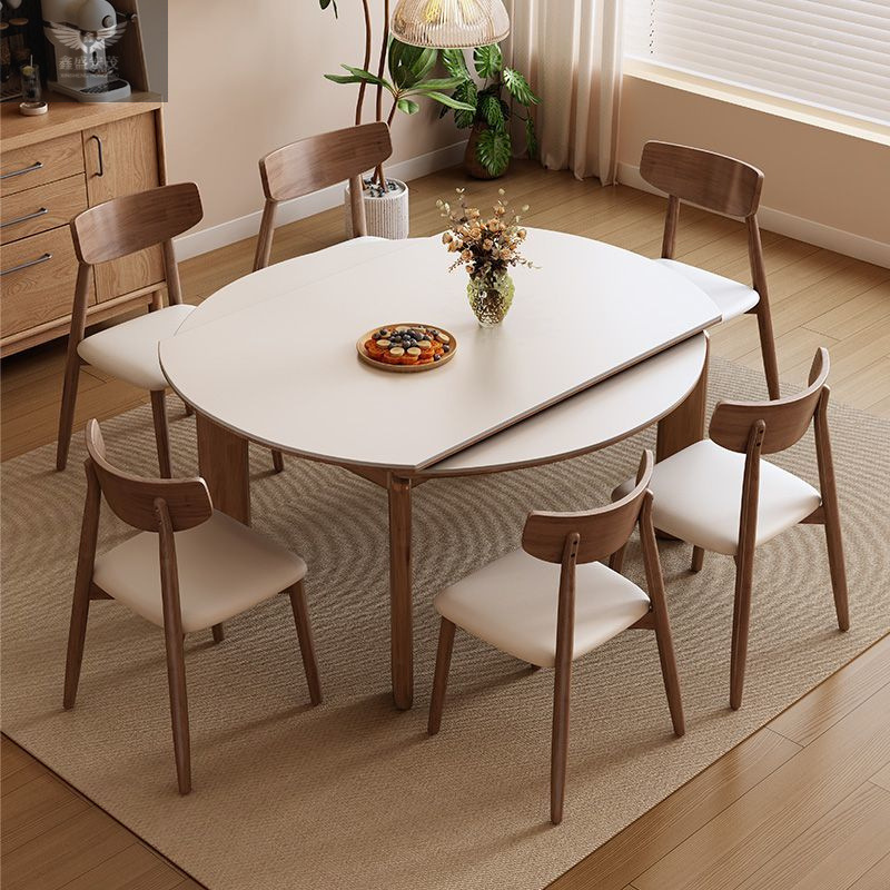 Madera de fresno, madera maciza, radio, mesa de comedor de tablero de roca de estilo nórdico de estilo japonés, mesa de comedor de troncos plegables con patas de elefante de estilo crema