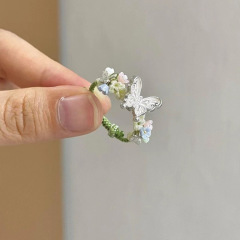「雨の中の碧蝶」蝶の花の指輪の精巧な古風は緑の縄の新しい中国式の食指の指輪の女性を編みます。