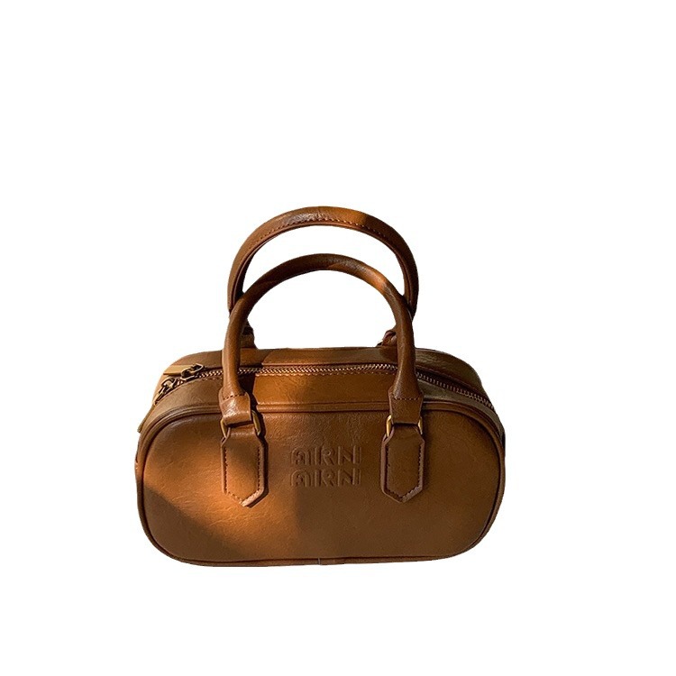 Bolsa de mujer de alto grado bolsa de mujer nicho nuevo bolso Retro bolsa de Boston Corea del Sur bolsa de mensajero del todo-fósforo