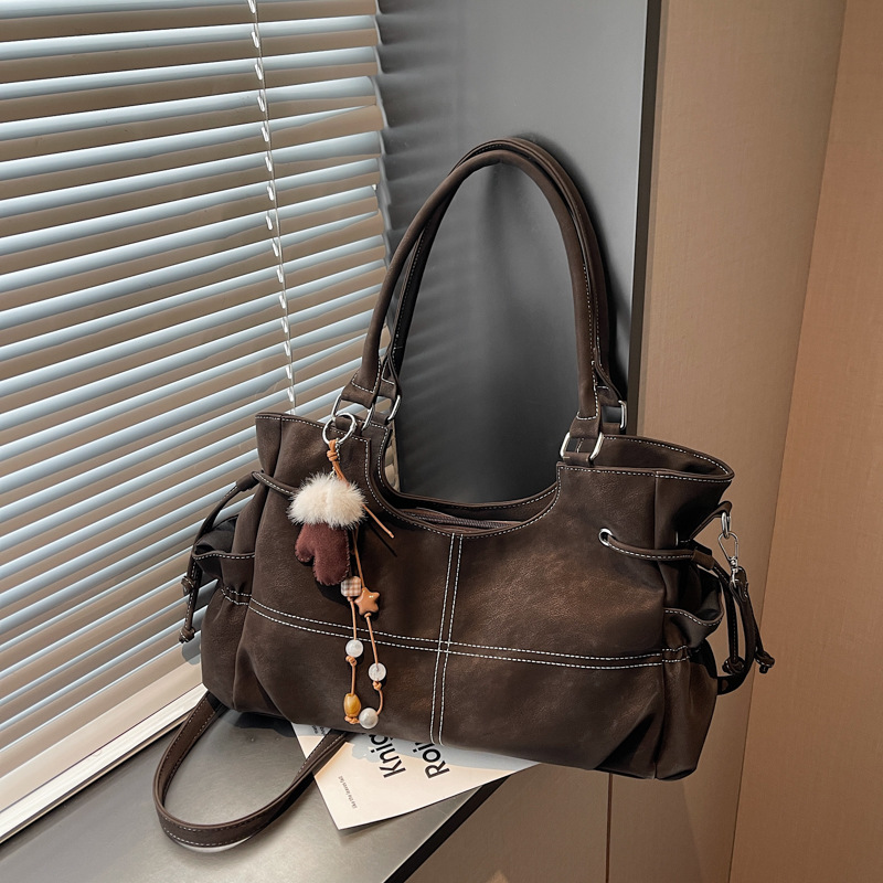 Retro nicho locomotora viento bolso otoño invierno 2025 nuevo sentido de alta calidad de viaje de hombro bajo la braza bolso de mujer